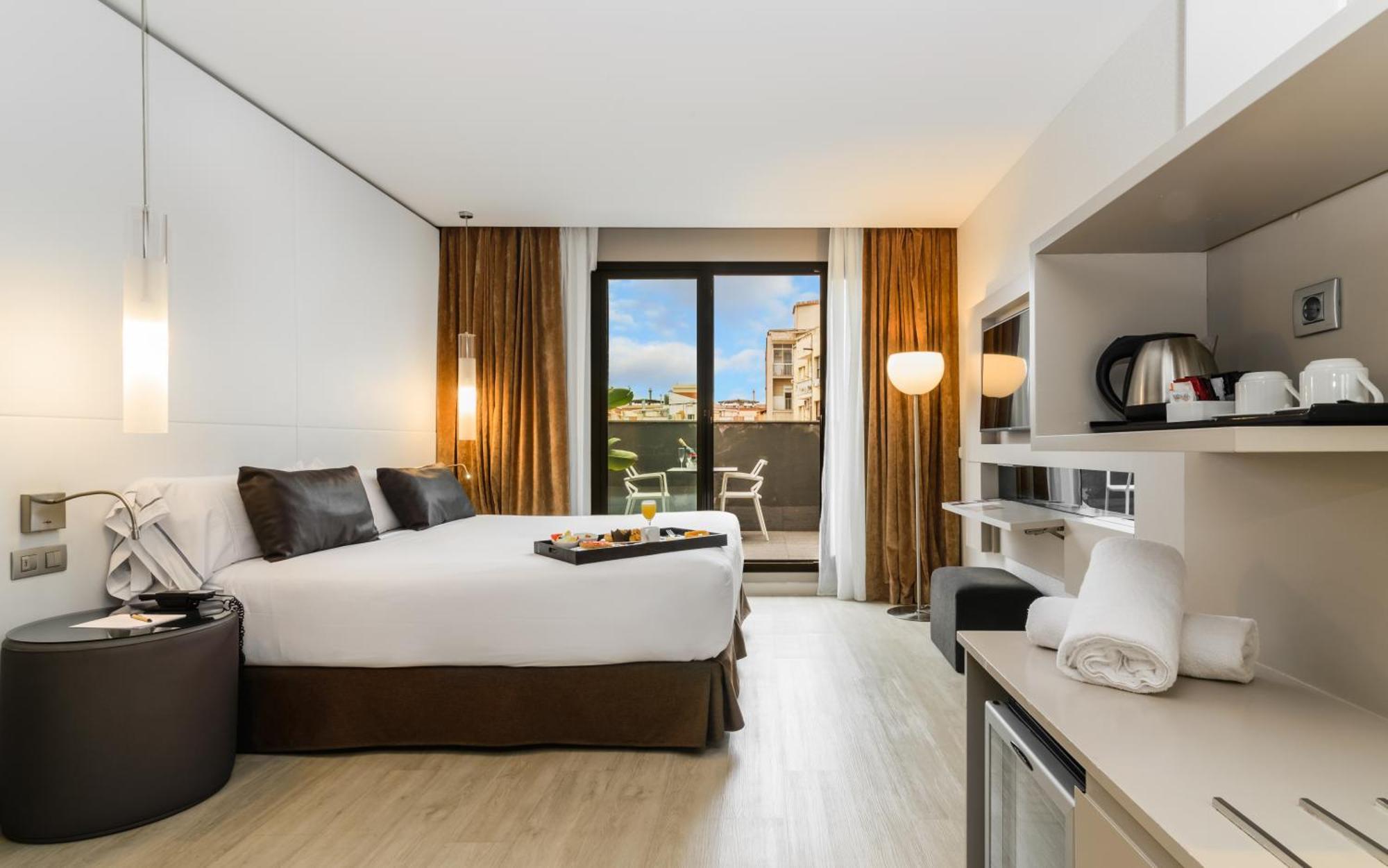 La chambre urbaine avec terrasse comprend un accès au spa par personne et par séjour